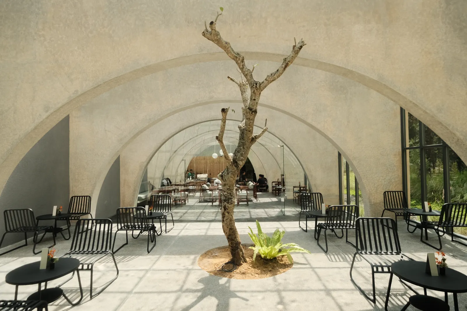 Arched dining lounge at Jiwanta surrounded by natural light